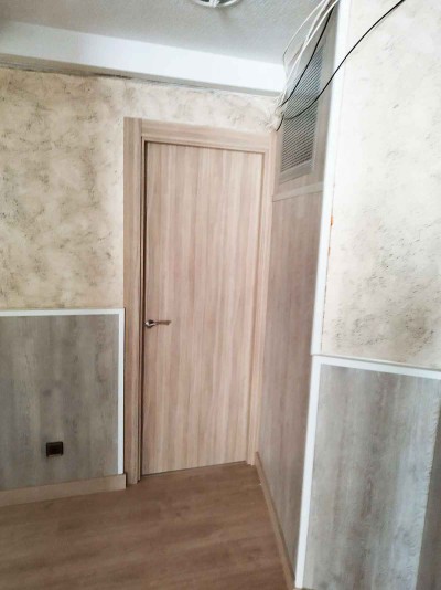 Puerta en acabado roble